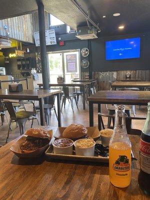 Seating area, Rib and brisket sandwich + sides