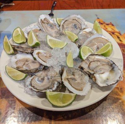 oysters on the half shell with lime