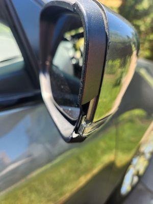 Passenger mirror broken and scraped