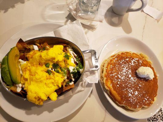 Chorizo Chilaquiles with a side of pancakes