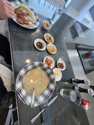 Rice dumpling soup with traditional Banchan (small side dishes that come with every entree)