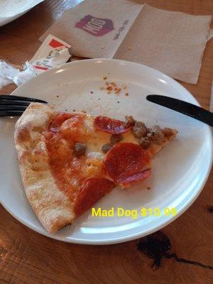 Feb. 2023 The Mad Dog (sausage, pepperoni, hamburger,and cheese) pizza easily fed us!   us mutts were full after splitting it!