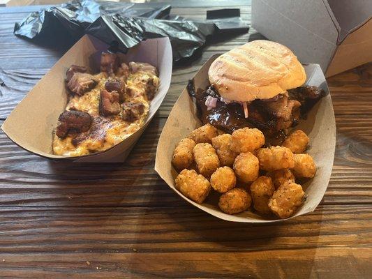 Pork Belly Mac and Cheese and Brisket Sandwich with tater tots