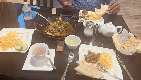 Goat Karahi with naan, rice, and mint chutney, Kashmiri Pink tea...not shown in the photo is the yummy Kheer.