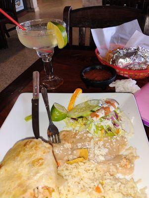 Shrimp burrito  rice beans onion and cilantro. Salas on the side, House margarita $8
 And the chips are. Very light, and salsa mild tasty