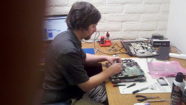 Joel doing a Laptop Motherboard replacement.