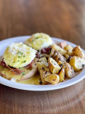 Eggs Benedict Florentine (made with prosciutto and spinach and a homemade hollandaise) served with garlic rosemary potatoes. Sundays 11-2