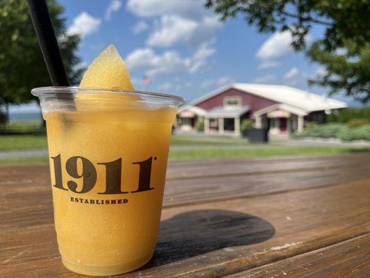 Outdoor seating with a great view and a frozen orchard Palmer.