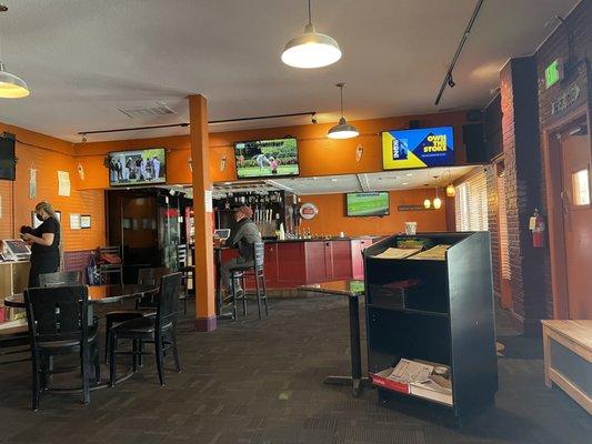 Awkward design. Sports bar vibes with beach decor.