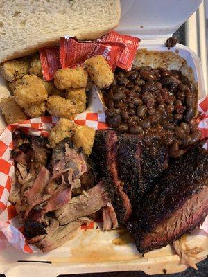 2 meat plate, pork and brisket with sides of beans and tator tots