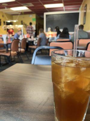 Iced tea and restaurant interior