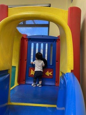 Playground slide inside the building