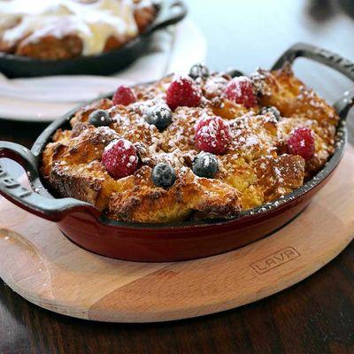 Cast Iron French Toast: rustic challah, berries, powdered sugar, maple syrup