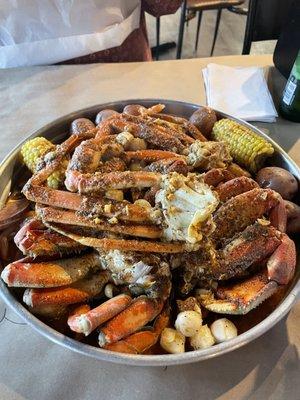 Build Your Own Boil of Shrimp, Snow Crab, Scallops, Dungeness Crab and Sausage with potatoes and corn.Perfect celebration meal for 3.