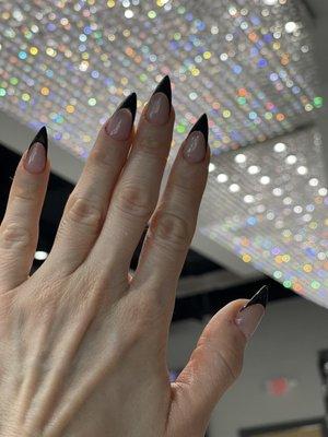 Acrylic stiletto nails with no-chip French tip by Tracy Ly