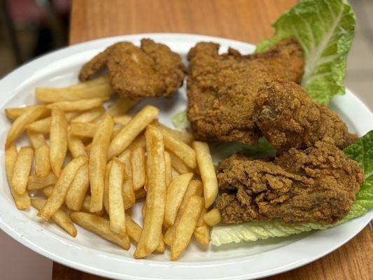 Fried chicken platter with fries.