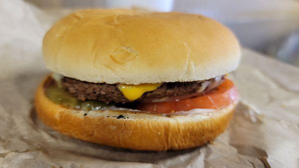 #42 on Texas Monthly's 2009 Best Burger list. Cheeseburger (Jalapeño Jack & American) with Mayo, Tomato, Onion, and Pickle