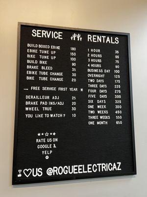 Bicycle and electric bicycle repair service menu and electric bike rental rates menu.