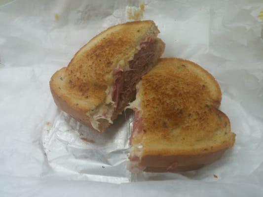 The New Yorker, hot pastrami, corned beef, melted swiss cheese with dijon mustard on rye.