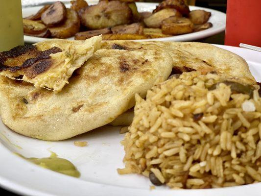 Chicken, cheese and pork papusas with rice and sweet plantains