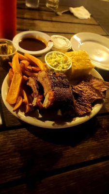 The Brisket and Baby with fries, coleslaw, and cornbread.