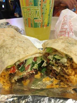 Carne Asada Burrito with rice , cheese cilantro, lettuce tomato & green salsa with free drink M- Th