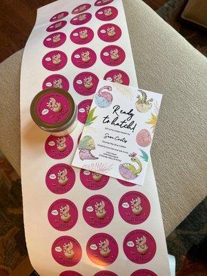 Baby shower favor stickers, and shower invitations.