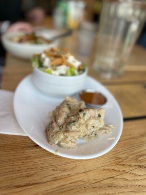 Smothered chicken with side salad