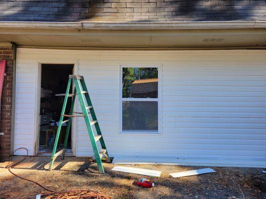 Took down garage door built a wall. Turned garage into a room.