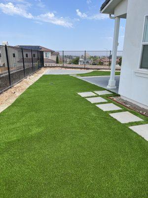 Synthetic turf with concrete steps