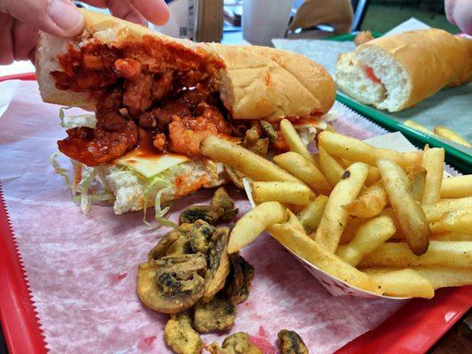 Buffalo Shrimp poboy, add Swiss cheese. Scored a few fried mushrooms, too. It's a good day.