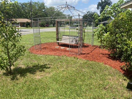 Weeded laid fabric and new mulch in a swing area