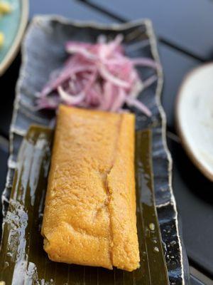 Marinated red onion with a tamale outstanding!