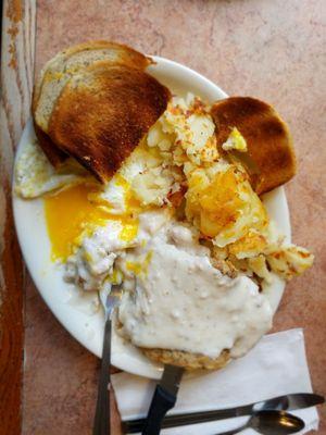 Country Fried Steak - sausage gravy over beef pattie, with fried potatoes, toast and over easy eggs. Good enough to order again!