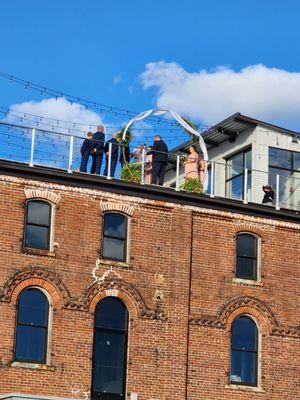 Wedding  on the rooftop waterfront at the mulberry house Washington NC