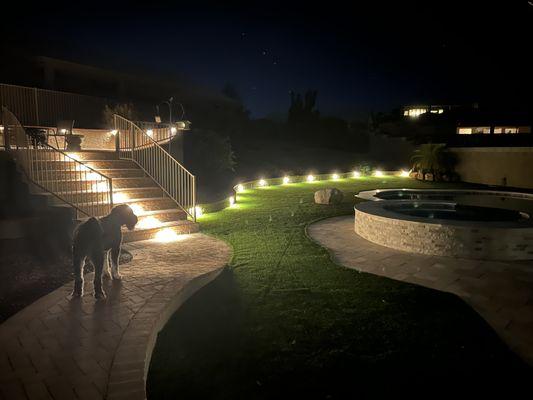 Landscape lighting installation and artificial turf