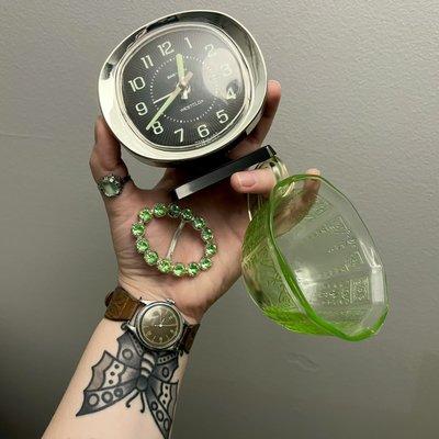 Uranium glass teacup and jewelry pieces, radium watch, post-radium clock (I'll get a radium one one of these days!!).