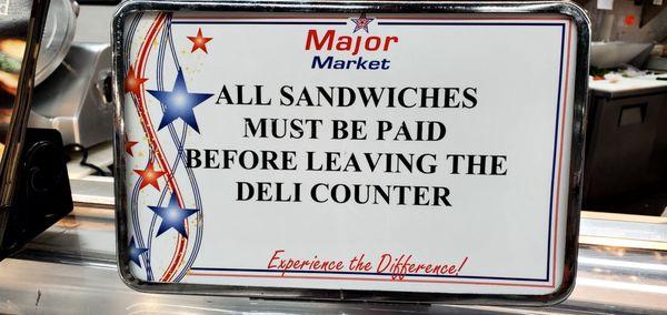 All Sandwiches Must Be Paid for at the Deli Counter