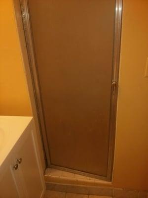 broken bathroom shower door