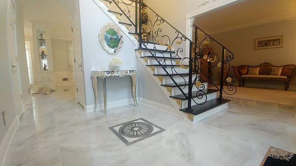 A gorgeous porcelain inlay adds such an elegant touch to this entry!