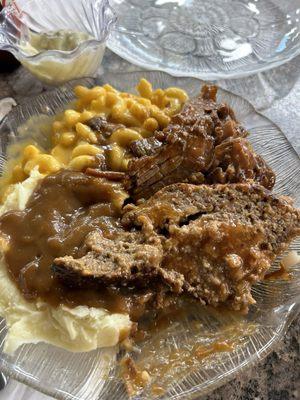 I piled up my plate with meatloaf, bbq brisket, mashed potatoes, and Mac and cheese. Very good overall.