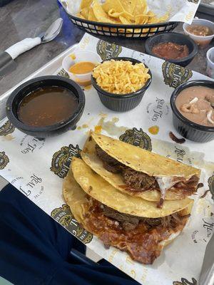 Three red tacos with consomé combo! Love it!