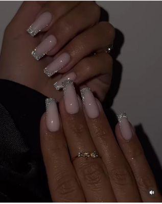 Nude coffin nails with silver glitter French tips by Ava Beauty Lounge