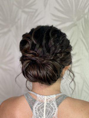 Textured low updo for a bride.