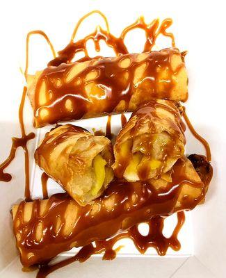 Turon - banana and jackfruit wrapped in crispy lumpia wrapper drizzled with coconut jam latik