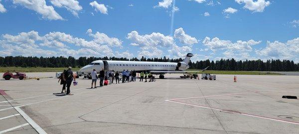 The Clear Sky and walk to waiting plane.