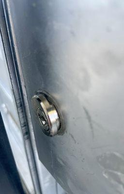 You can see how I can literally pull the lock out of its hole because its that jammed and the maintenance staff didn't fix it!