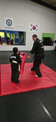 Pad push wrestling for coordination, competition and fun physical challenge.