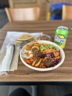 Big Greek Bowl with falafel and pita bread.