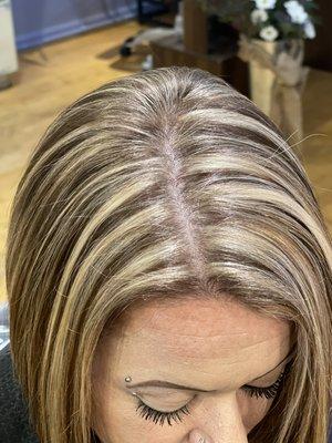 Another version of chunky highlights with an a-line razor cut.